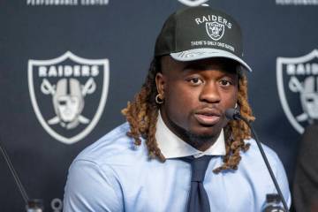 Raiders running back Ashton Jeanty answers questions during a news conference at the Intermount ...