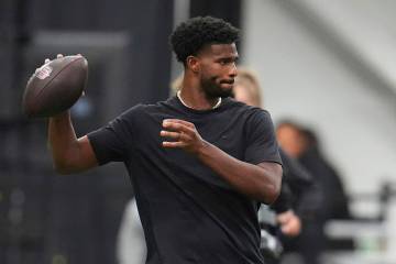 Colorado quarterback Shedeur Sanders (2) takes part in passing drills during Colorado's NFL foo ...