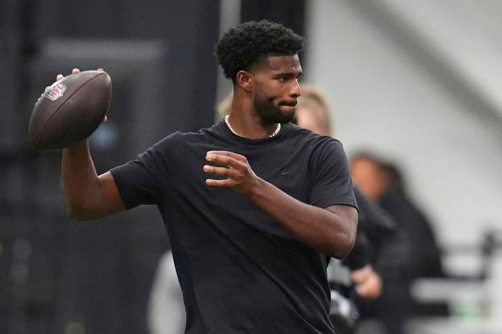 Colorado quarterback Shedeur Sanders (2) takes part in passing drills during Colorado's NFL foo ...
