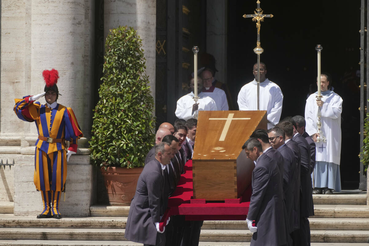 The coffin of Pope Francis arrives at St. Mary Major Basilica in Rome Saturday, April 26, 2025. ...
