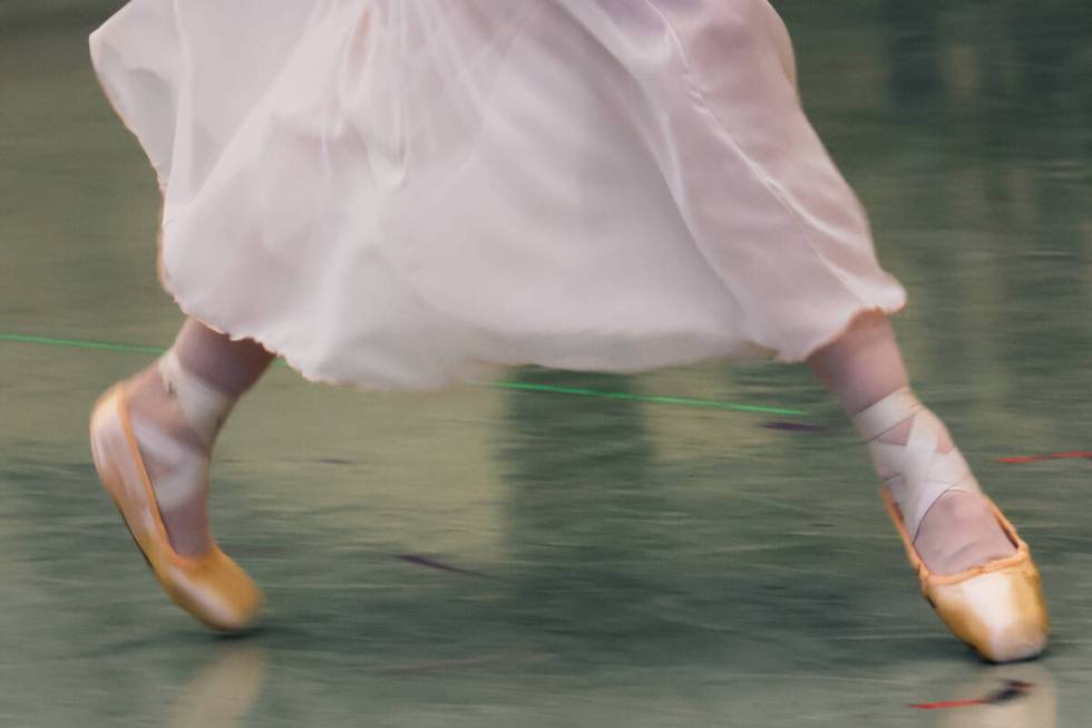 Emma McGirr dances across the floor during a dress rehearsal for “Peter Pan” at the Nevada ...