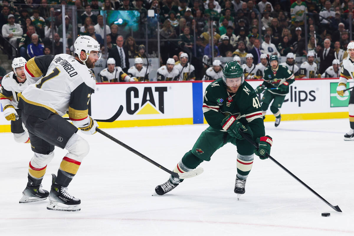 Minnesota Wild center Gustav Nyquist (41) handles the puck against Vegas Golden Knights defense ...