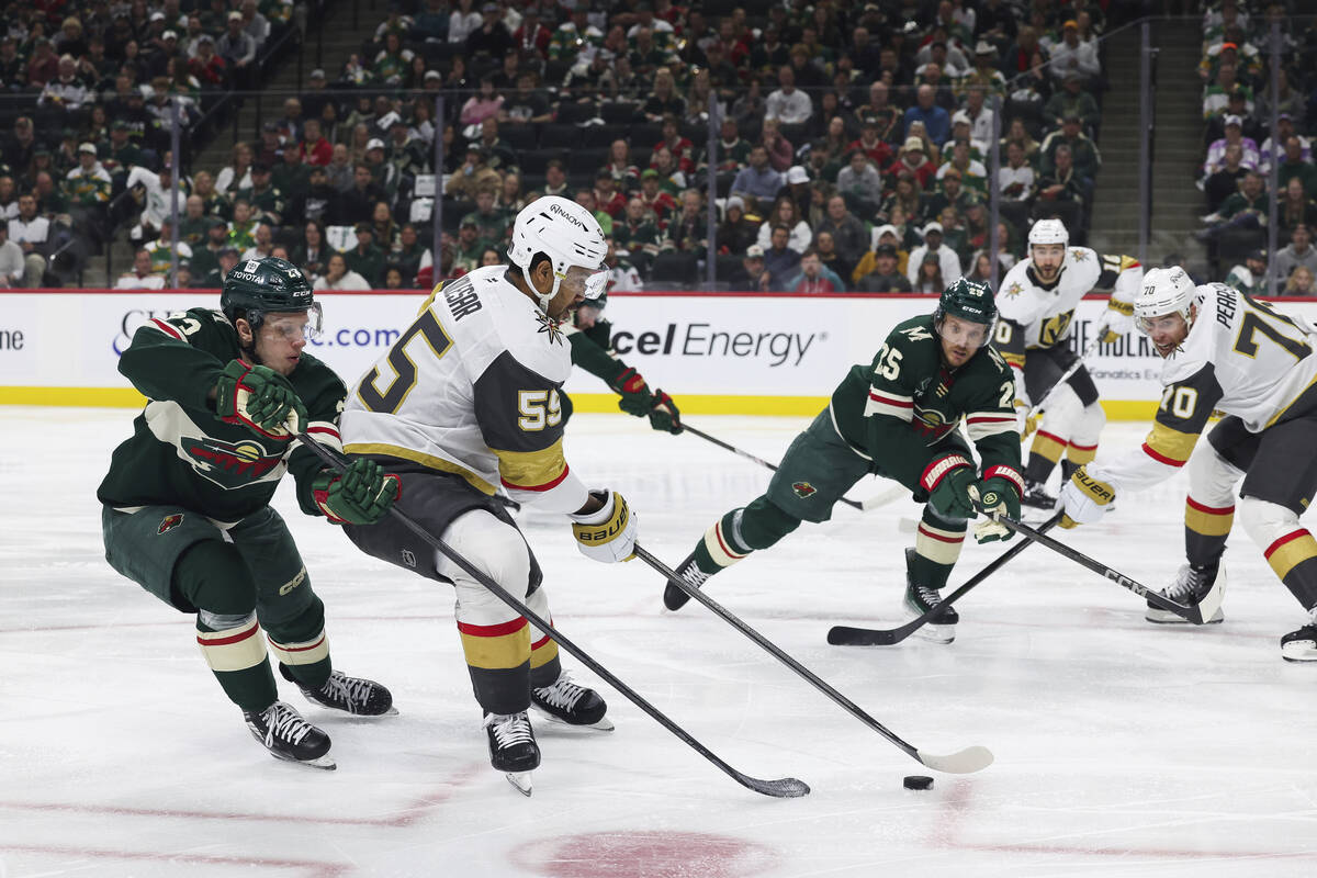Vegas Golden Knights right wing Keegan Kolesar (55) handles the puck against Minnesota Wild cen ...