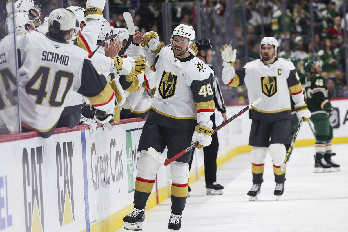 Vegas Golden Knights center Tomas Hertl (48) celebrates with teammates after scoring a goal aga ...