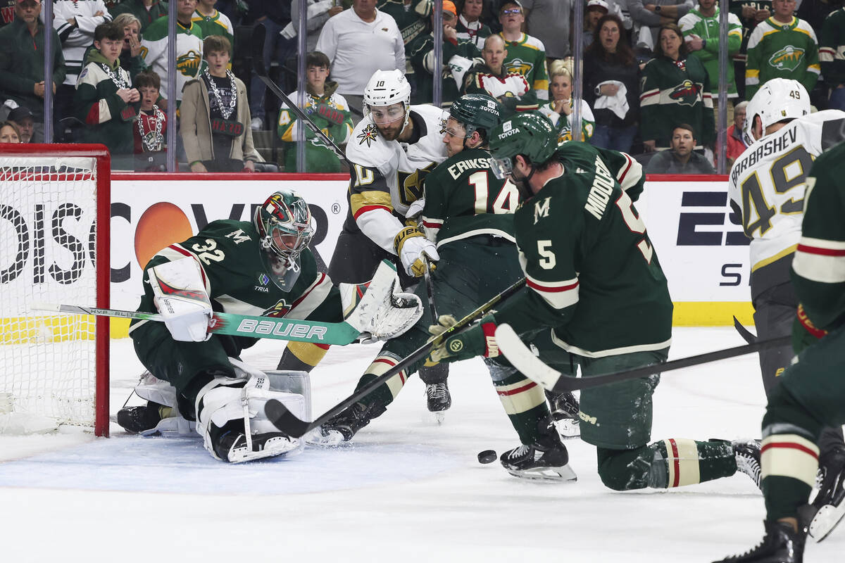 Vegas Golden Knights center Ivan Barbashev (49) skates in to shoot a rebound in for the winning ...