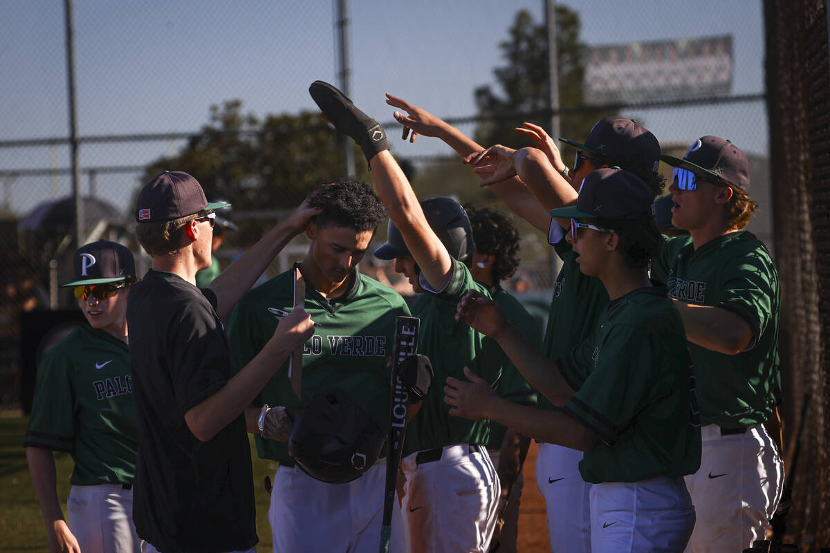 Palo Verde's Keimani Johnson, center left, celebrates his run against Shadow Ridge with teammat ...