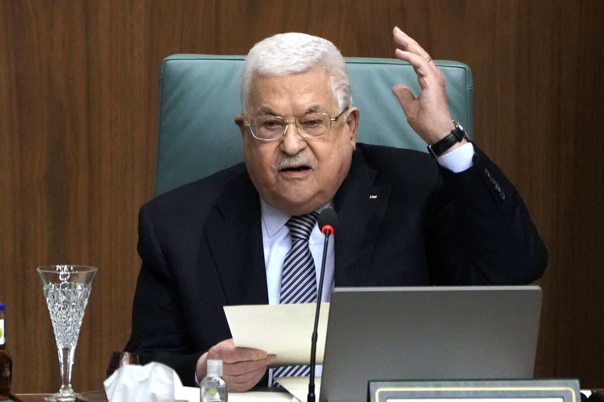 FILE - Palestinian President Mahmoud Abbas speaks during a conference at the Arab League headqu ...