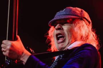 Angus Young of AC/DC performs during their “Power Up” tour stop at Allegiant Stad ...