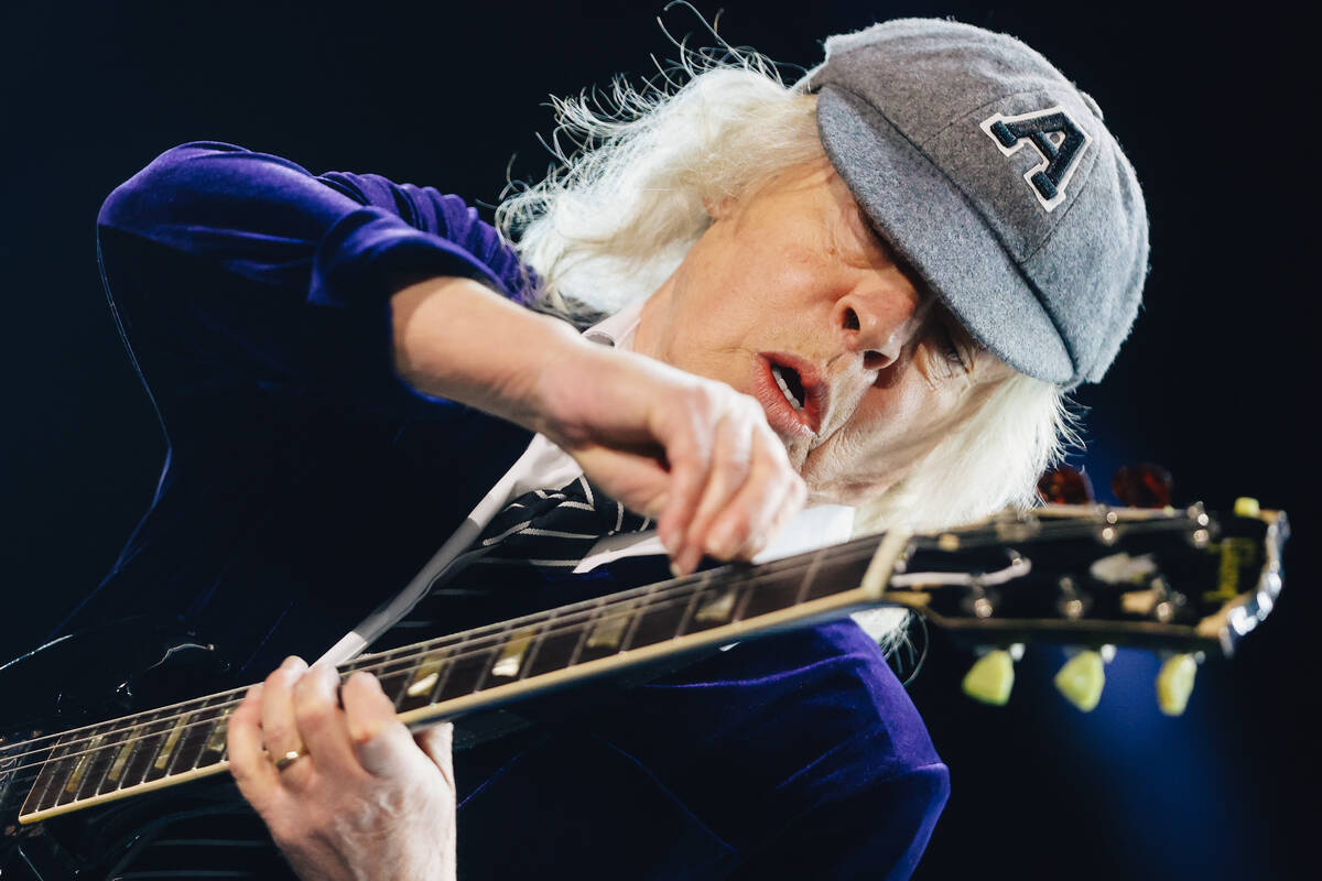 Angus Young of AC/DC performs during their “Power Up” tour stop at Allegiant Stad ...
