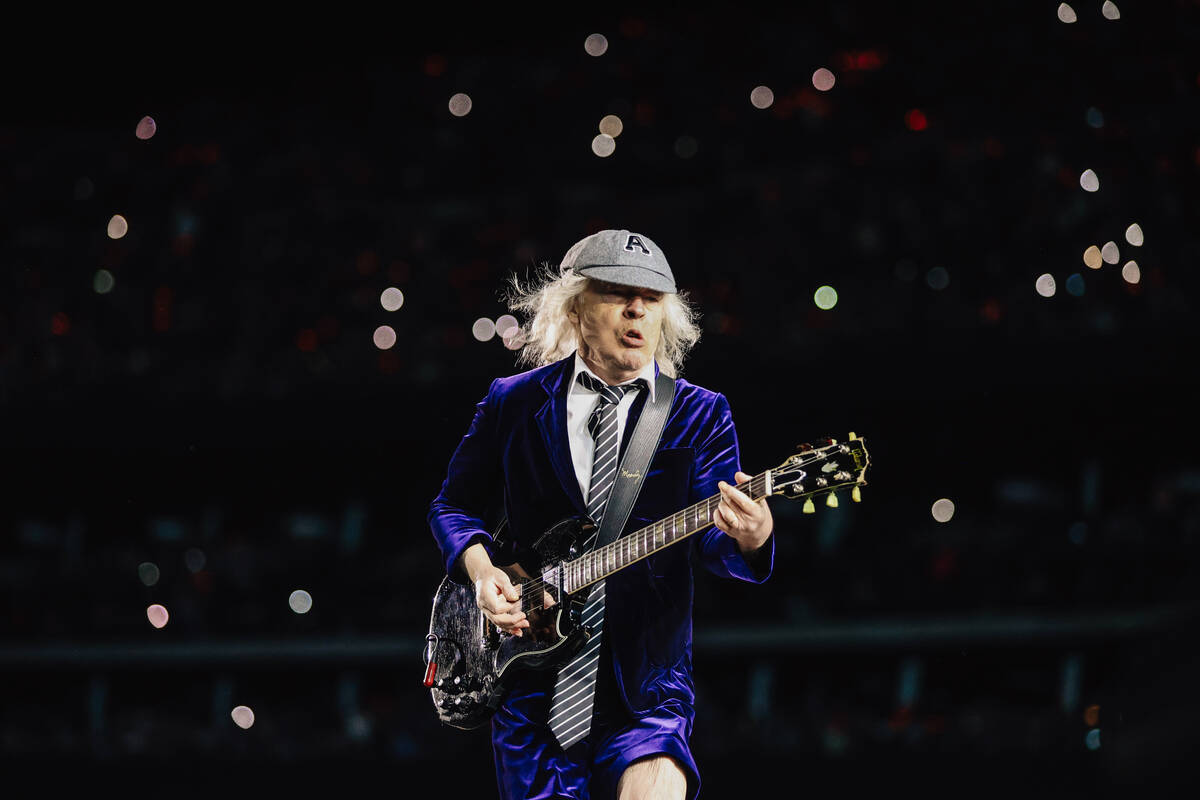 Angus Young of AC/DC performs during their “Power Up” tour stop at Allegiant Stad ...