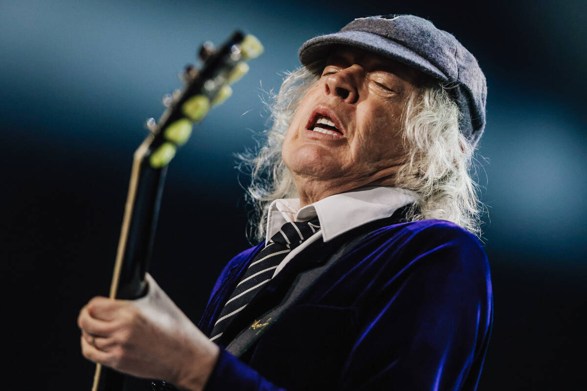 Angus Young of AC/DC performs during their “Power Up” tour stop at Allegiant Stad ...
