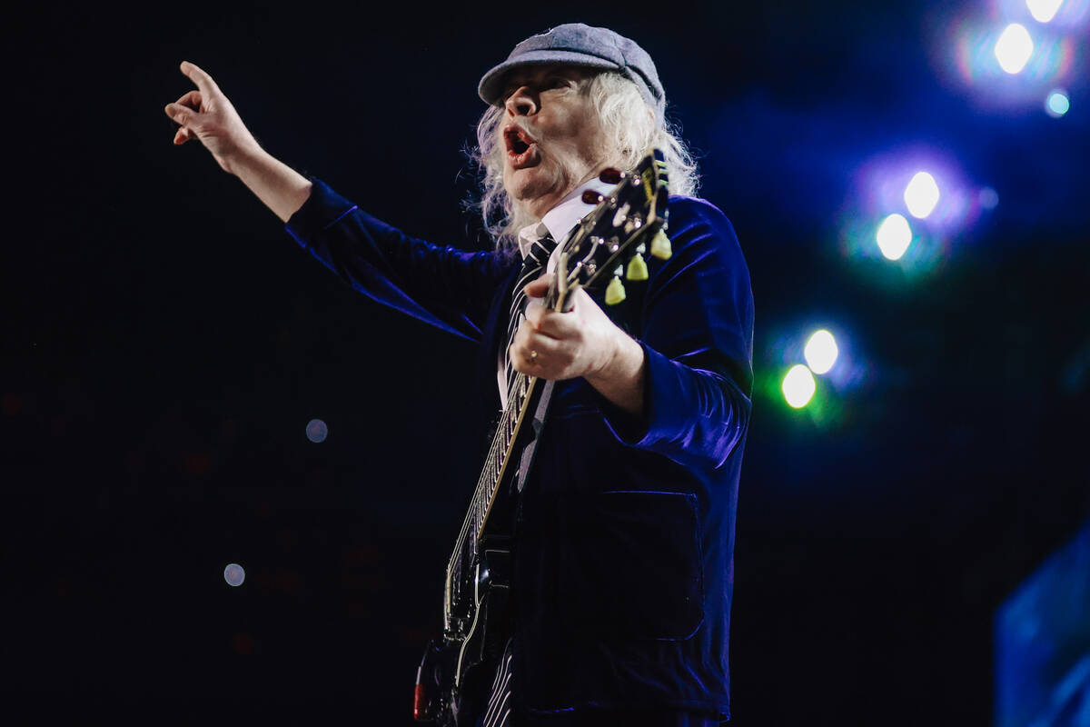 Angus Young of AC/DC performs during their “Power Up” tour stop at Allegiant Stad ...