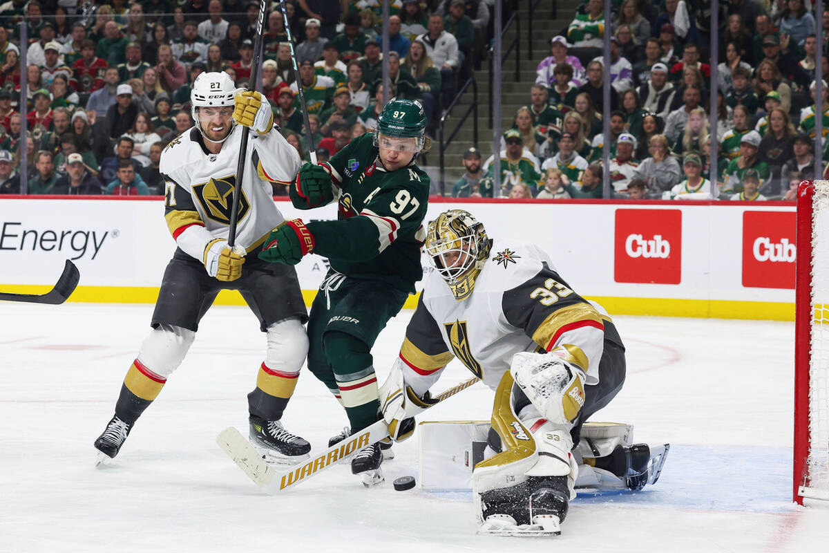 Minnesota Wild left wing Kirill Kaprizov (97) and Vegas Golden Knights defenseman Shea Theodore ...