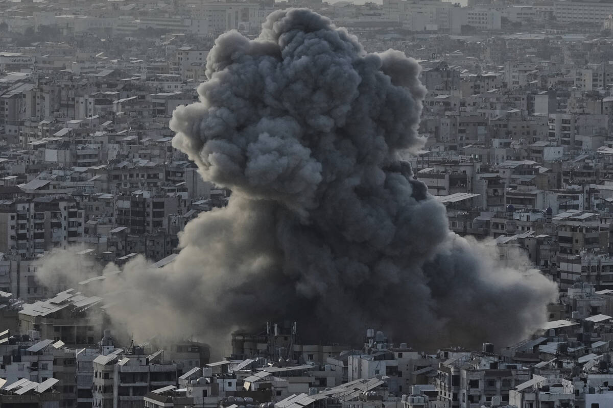 Smoke rises following an Israeli airstrike on Dahiyeh in the southern suburb of Beirut, Lebanon ...