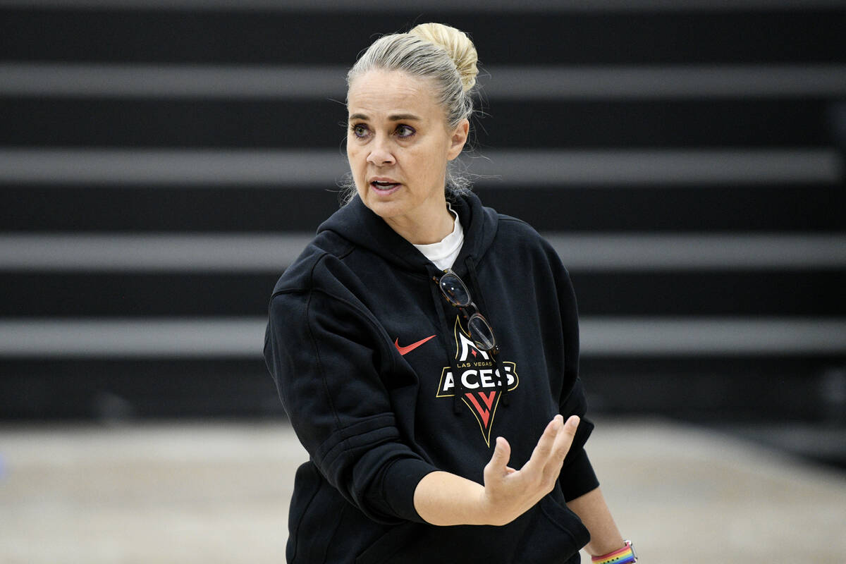 Las Vegas Aces head coach Becky Hammon talks to her players during the Aces first day of traini ...