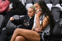 Las Vegas Aces head coach Becky Hammon and A’ja Wilson talk during the Aces first day of trai ...
