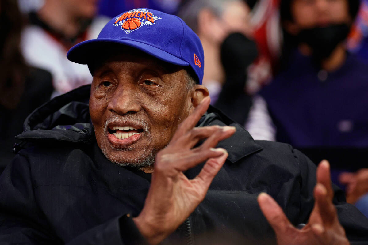 Former New York Knicks Dick Barnett looks on as the Knicks take on the Houston Rockets during t ...