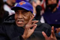Former New York Knicks Dick Barnett looks on as the Knicks take on the Houston Rockets during t ...