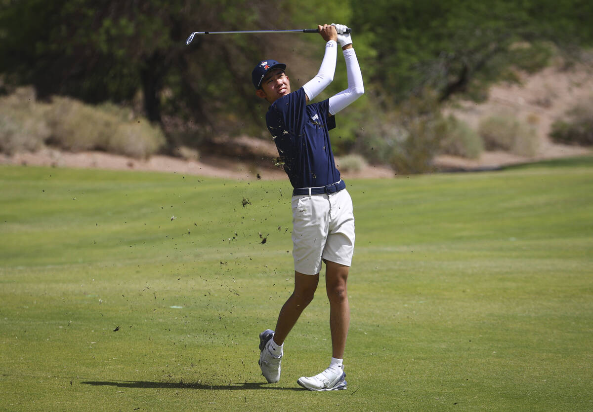 Coronado’s Brent Chung hits a fairway shot during a 5A Desert League boys golf match at Refle ...