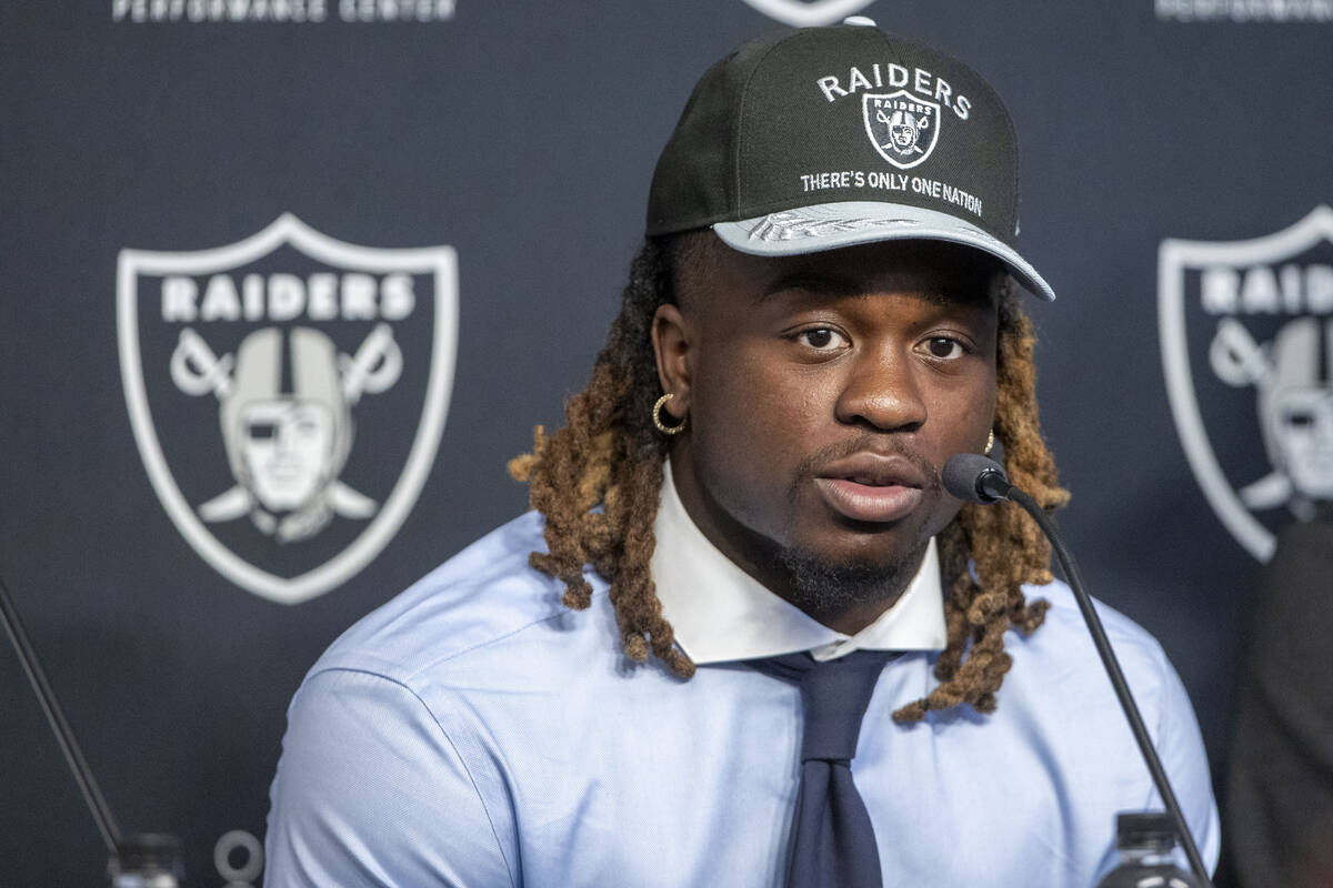 Raiders running back Ashton Jeanty answers questions during a news conference at the Intermount ...