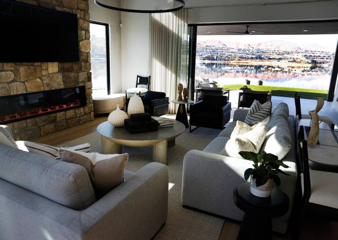 A living room is seen inside La Cova's one-story model home at South Shore Lake Las Vegas, on T ...
