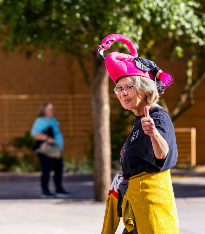 A Golden Knights fan wears a flamingo hat while outside before game five against the Minnesota ...