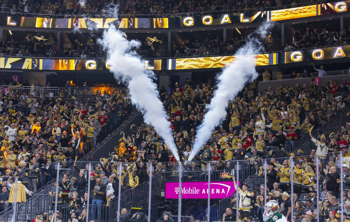 Golden Knights fans celebrate their second goal against the Minnesota Wild during the first per ...