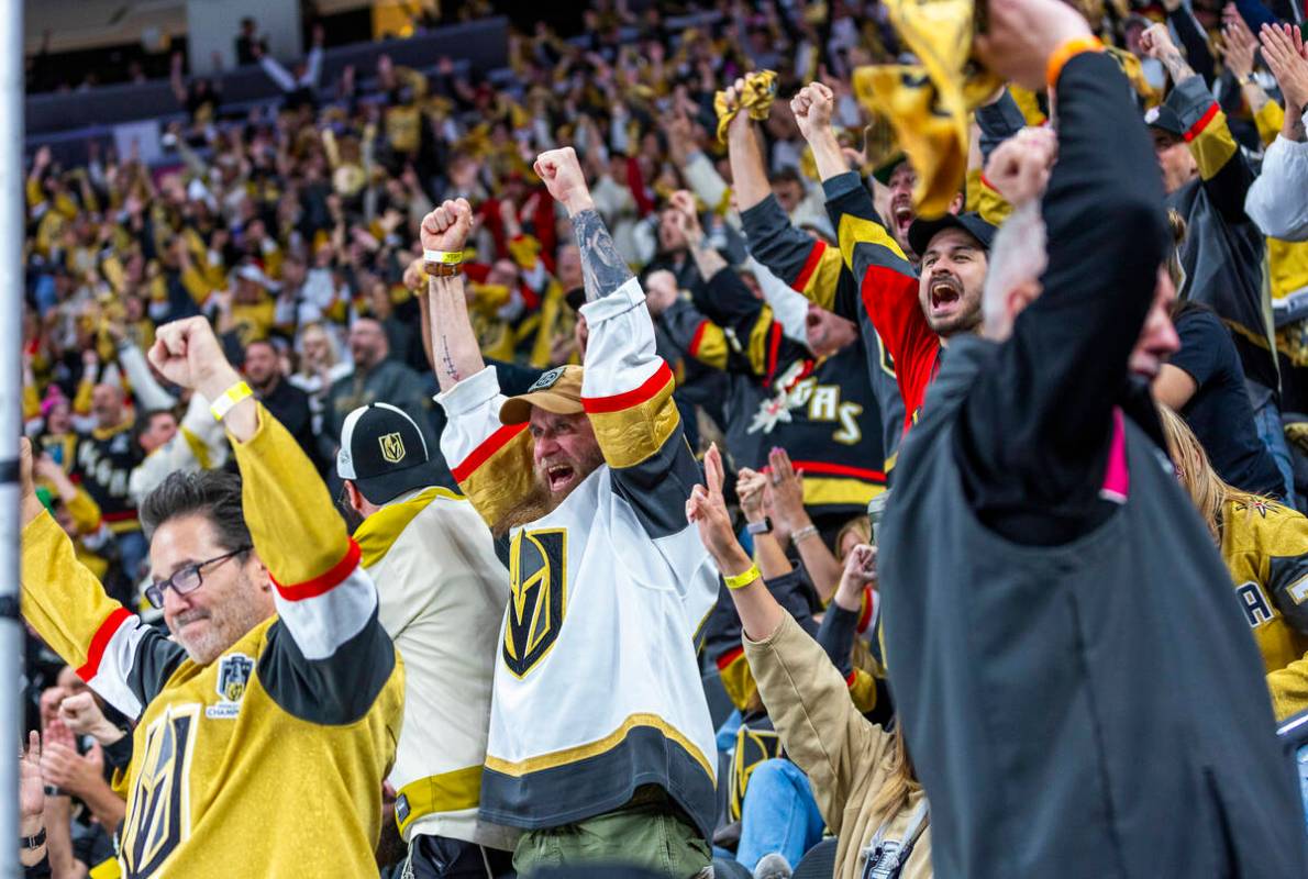 Golden Knights fans celebrate an overturn call on the score by the Minnesota Wild during the th ...