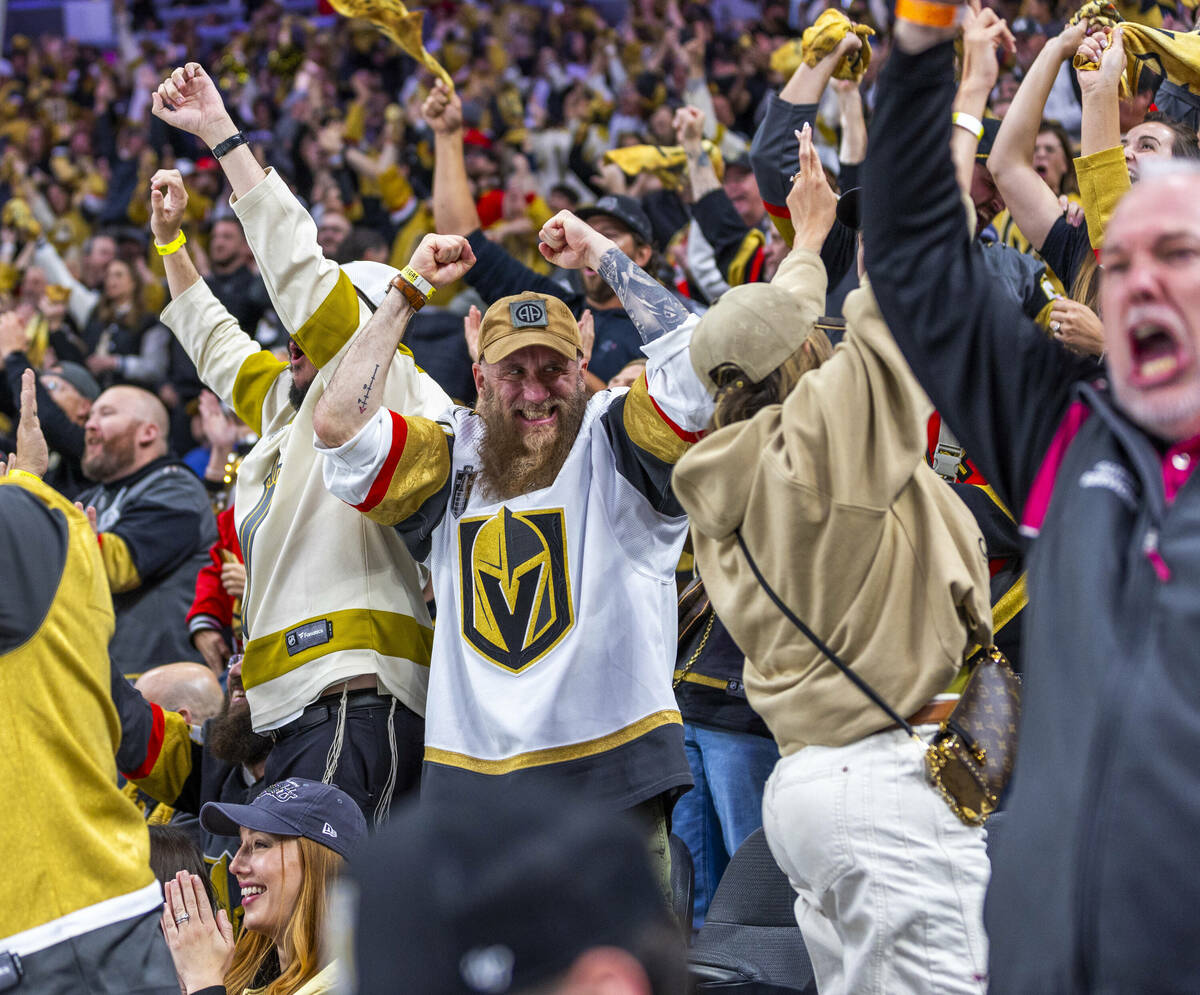 Golden Knights fans celebrate an overturn call on the score by the Minnesota Wild during the th ...