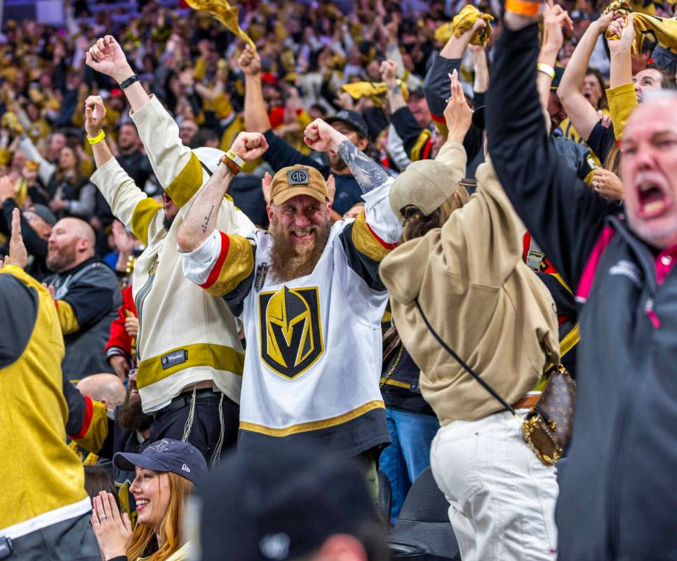 Golden Knights fans celebrate an overturn call on the score by the Minnesota Wild during the th ...