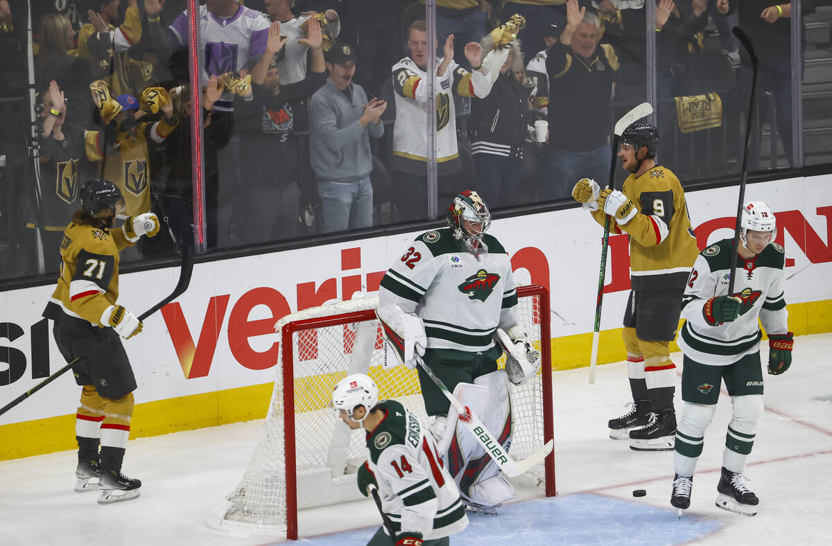 Golden Knights center William Karlsson (71) celebrates his goal with center Jack Eichel (9) dur ...