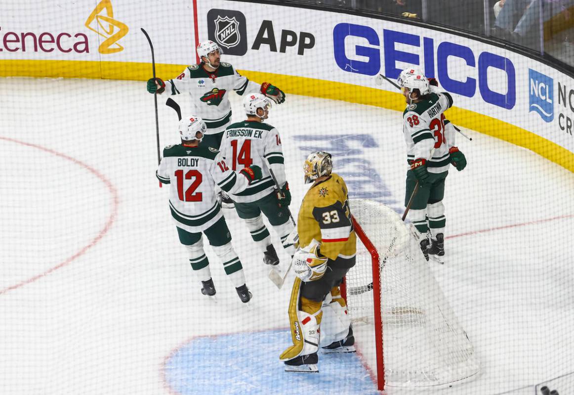 The Minnesota Wild celebrate a power play goal against the Golden Knights during the first peri ...