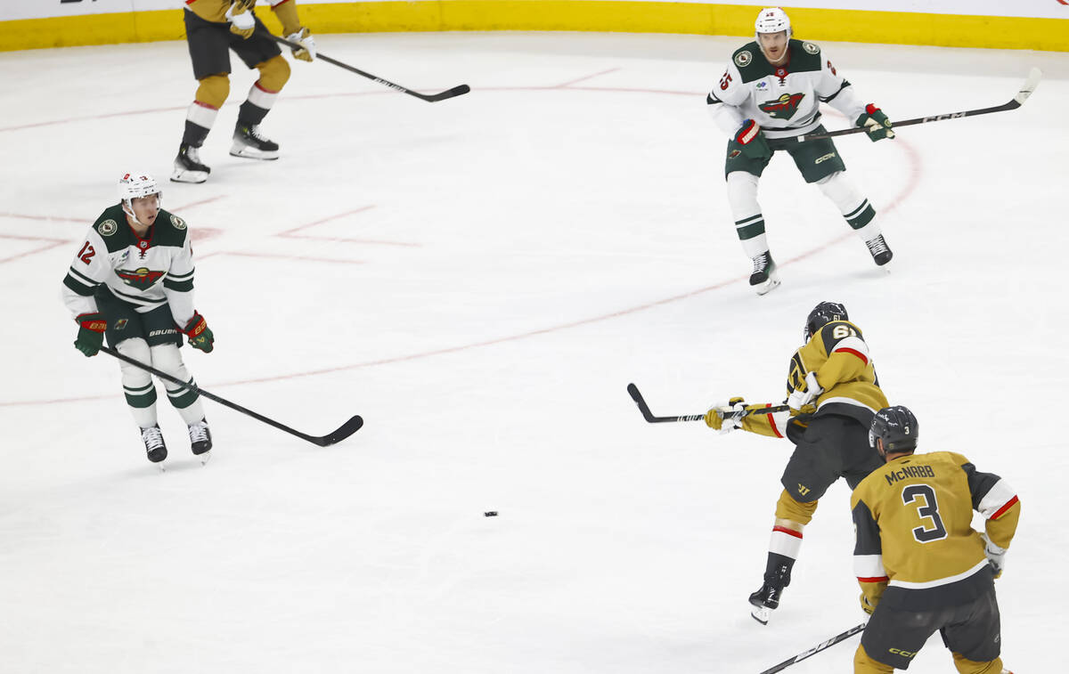 Golden Knights right wing Mark Stone (61) fires the puck into the net to score against Minnesot ...