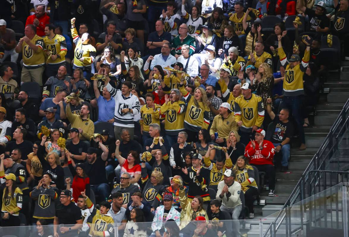 Golden Knights fans celebrate a goal against the Minnesota Wild during the first period of Game ...