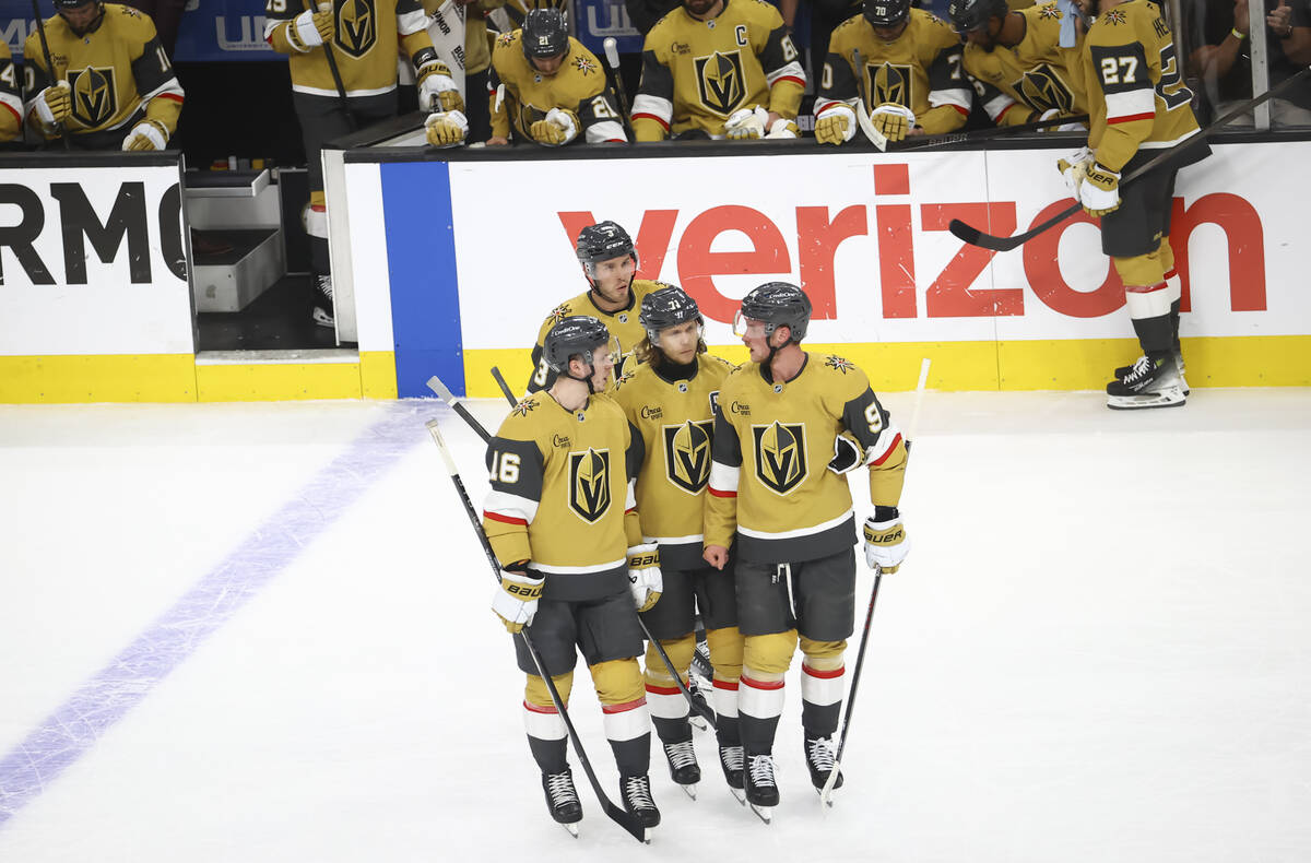 Golden Knights players, from left, Pavel Dorofeyev (16), Brayden McNabb (3), William Karlsson ( ...
