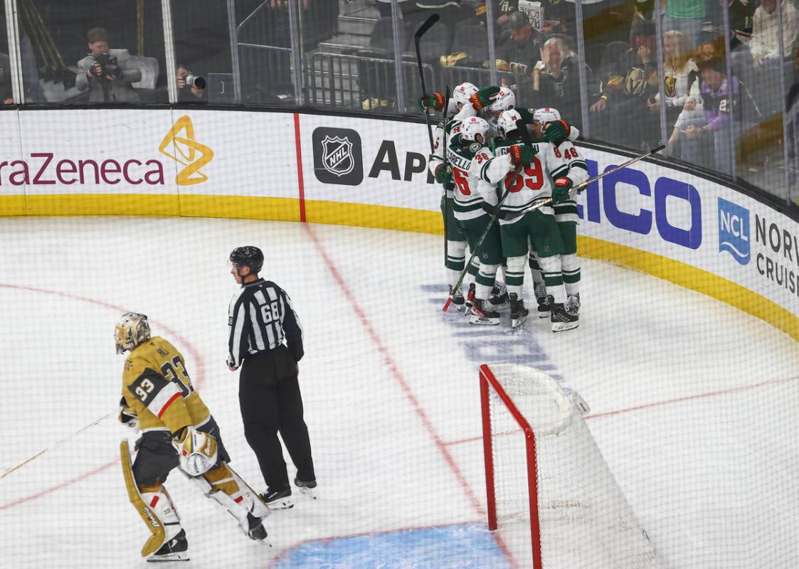 The Minnesota Wild celebrate a goal against the Golden Knights during the third period of Game ...