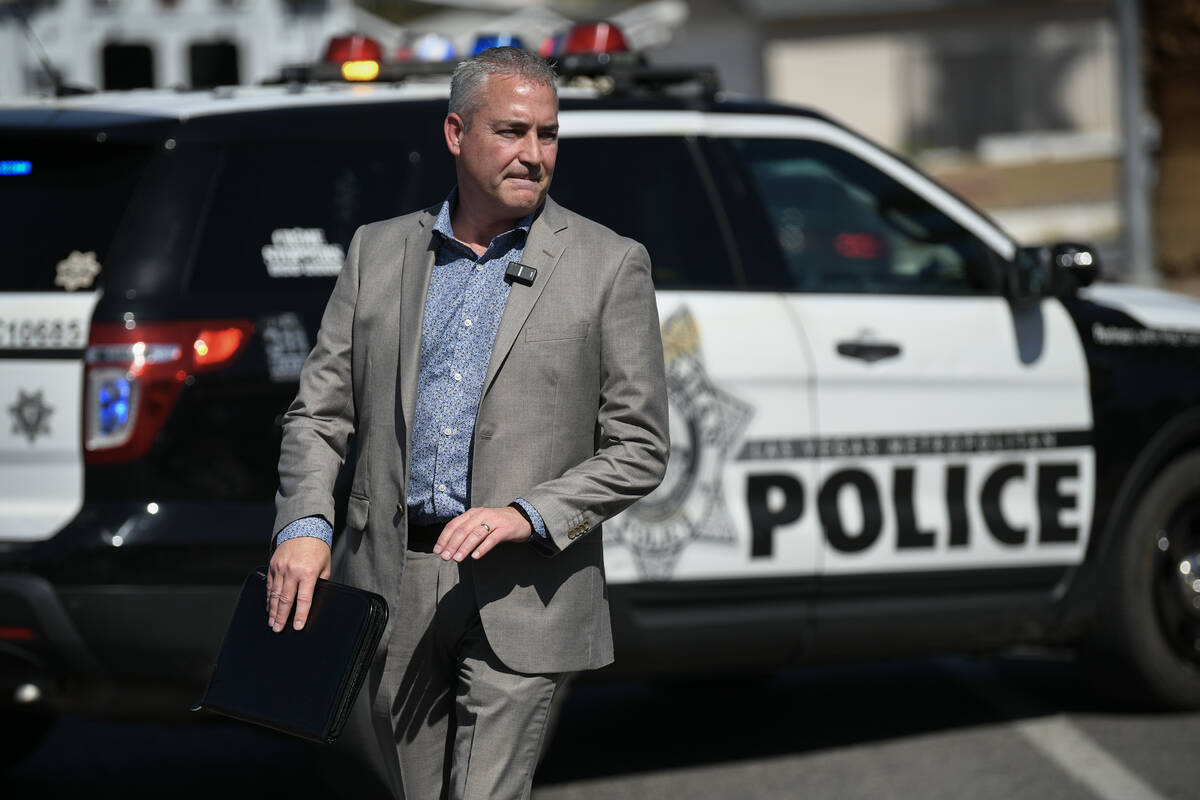Las Vegas Metropolitan Police Lt. Robert Price leaves a media brieving at the scene of a fatal ...