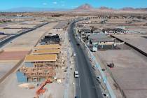 Houses are seen under construction on Gentle Swan Street in D.R. Horton’s Symmetry devel ...