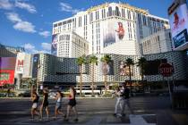 People visit the Las Vegas Strip near Planet Hollywood hotel-casino in Las Vegas. (File/Las Veg ...