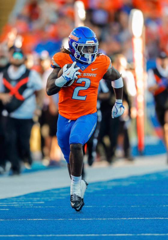 Boise State running back Ashton Jeanty (2) runs with the ball on a 75 yard touchdown run agains ...