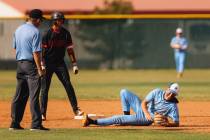 Foothill infielder Will Gibson (6) lays on the ground after catching the ball during a run in a ...