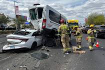 Firefighters respond to a five-vehicle crash at Harmon Avenue and University Center Drive on We ...