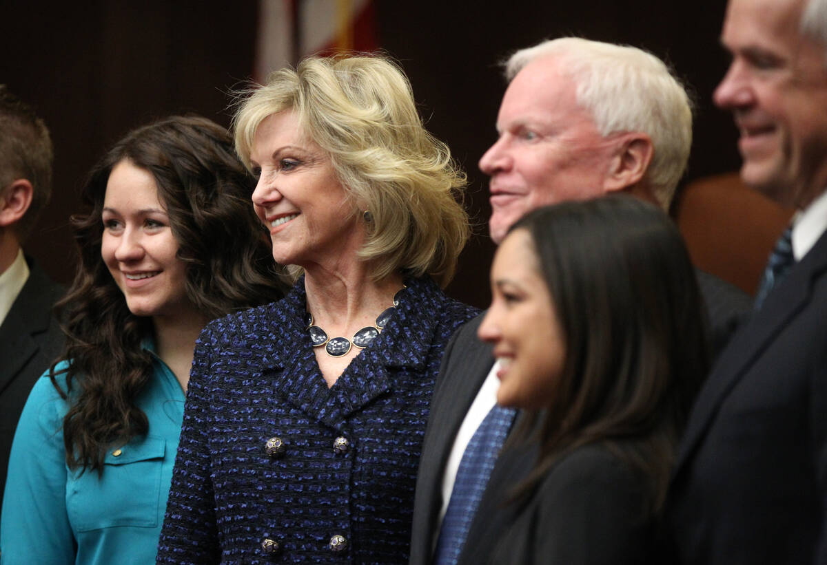 New Nevada State Board of Education members pose for group photos after taking the oath of offi ...