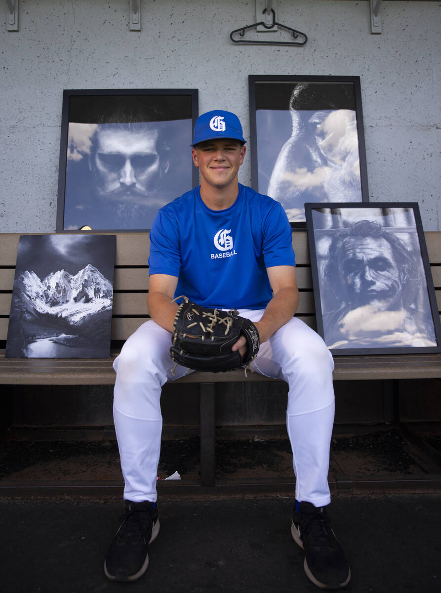 Bishop Gorman pitcher James Whitaker poses with some of his artwork in the dugout at Bishop Gor ...
