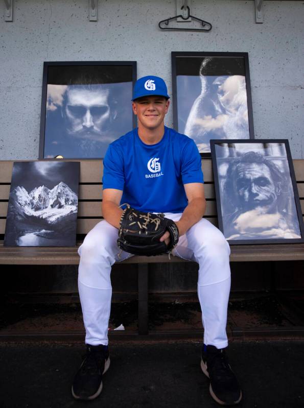 Bishop Gorman pitcher James Whitaker poses with some of his artwork in the dugout at Bishop Gor ...