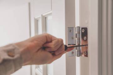 A binding door probably indicates a hinge problem, but it also may be that the door or frame is ...