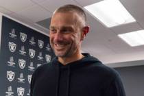 Raiders general manager John Spytek smiles as he leaves the media room following a news confere ...