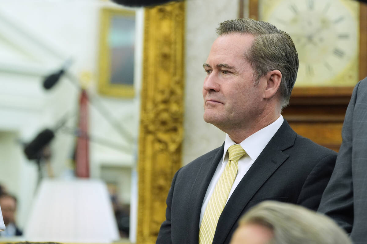White House national security adviser Mike Waltz listens as President Donald Trump meets with I ...