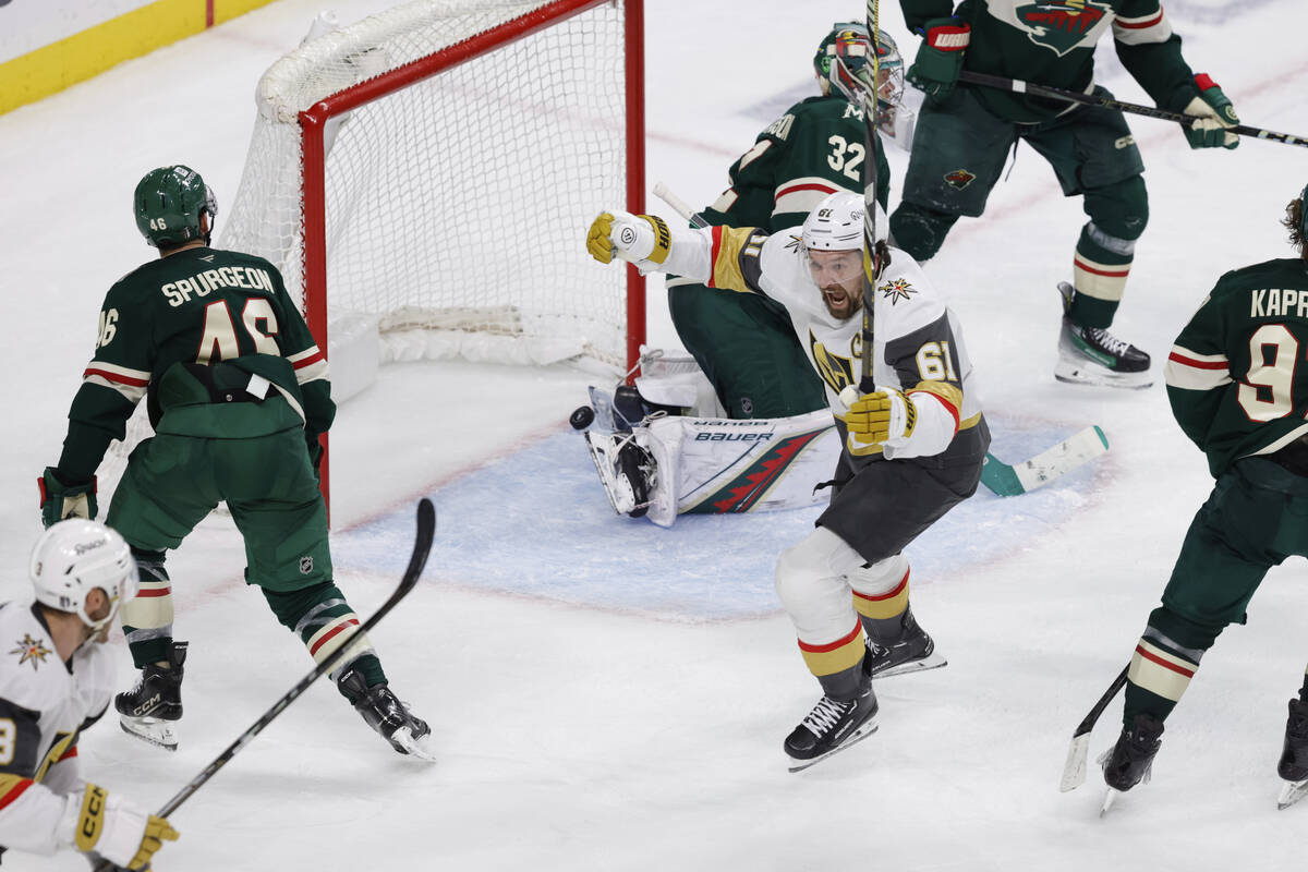 Vegas Golden Knights right wing Mark Stone (61) celebrates after scoring against Minnesota Wild ...