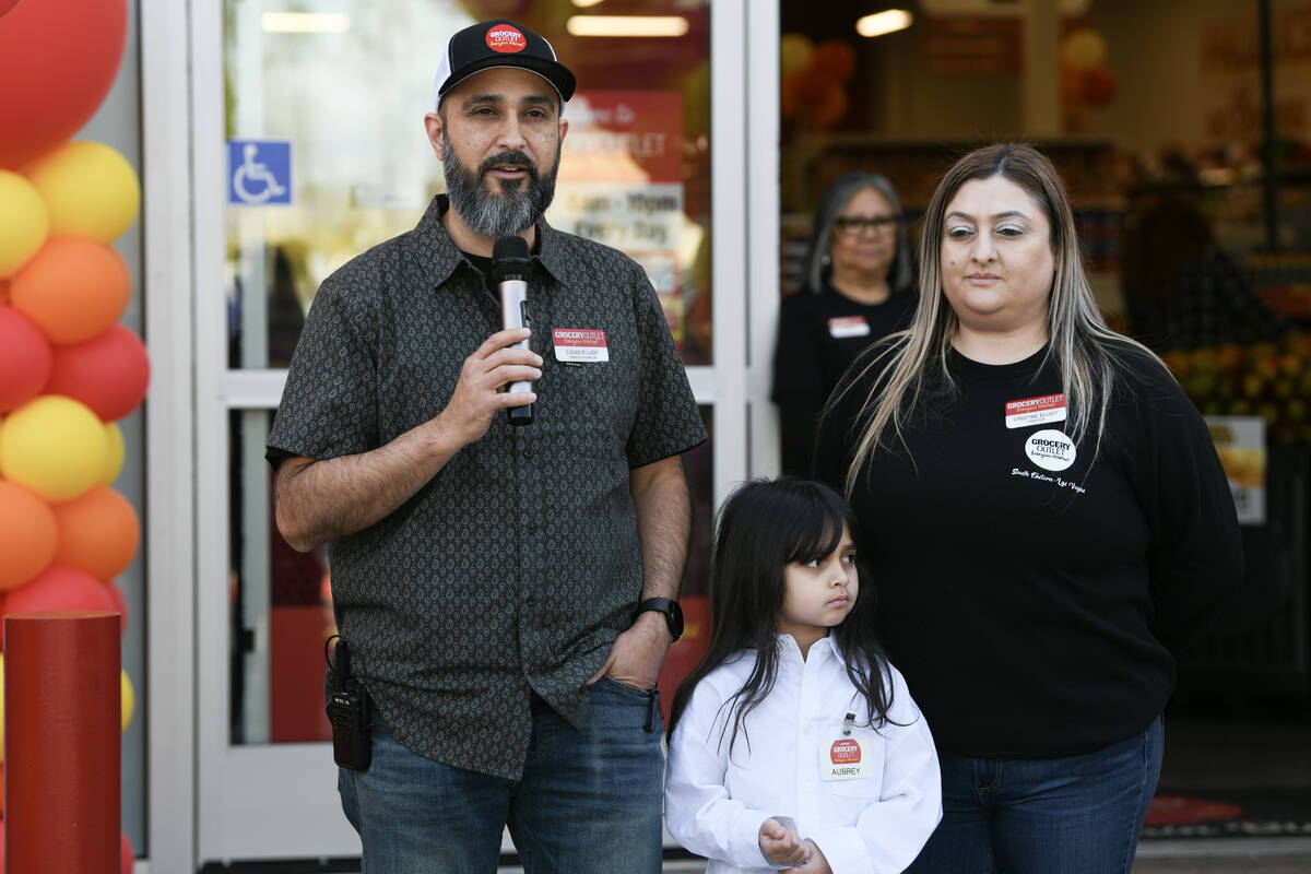 Store owners Louis and Christine Elliot are joined by their daughter Aubrey Elliot during the g ...